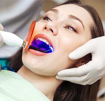 Woman receiving dental bonding treatment